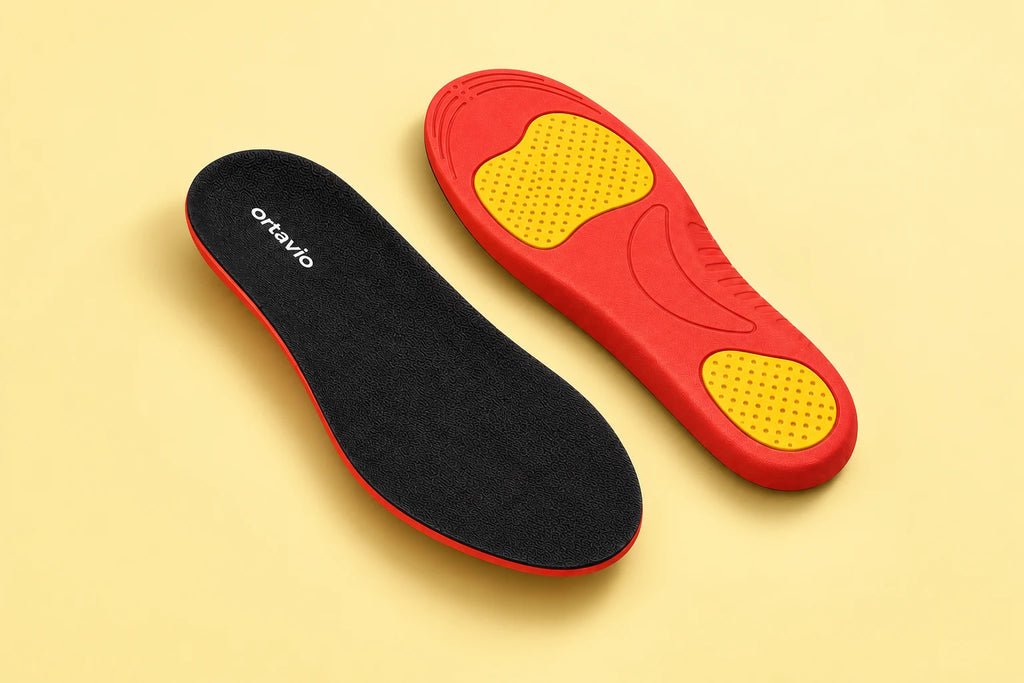 Ortavio ArcCore insoles with a red support base and yellow cushioning zones